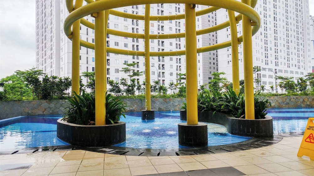 Restful 2Br Bassura City Apartment Near Shopping Mall